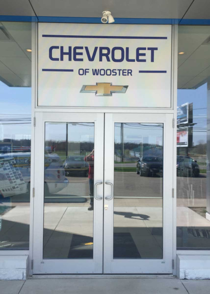 Custom window advertising decals at Chevrolet of Wooster dealership