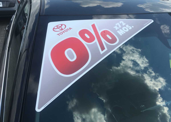 Window triangle decal at a Toyota dealership