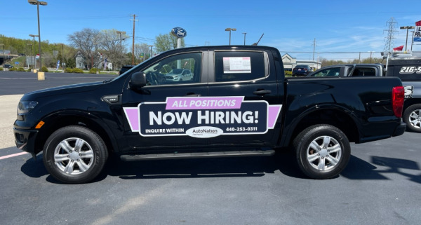 Magnetic vehicle sign advertising job openings at AutoNation in Amherst, OH