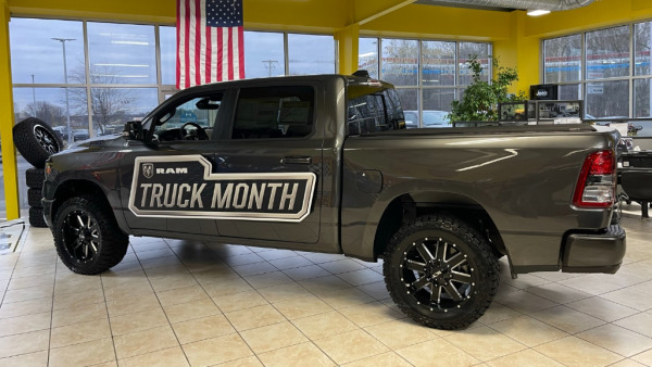 "Truck Month" magnetic vehicle sign at RAM dealership