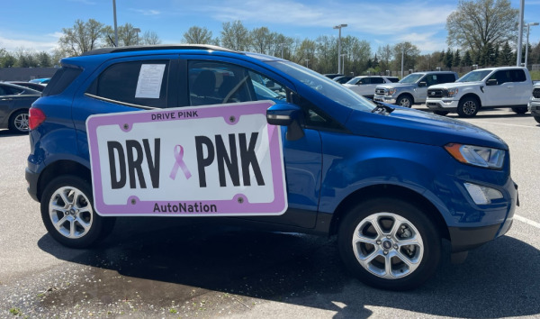 "Drive Pink" magnetic vehicle sign on SUV at AutoNation